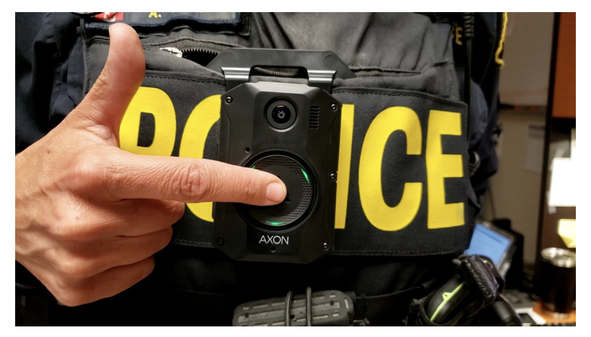 Police office activates body cam
