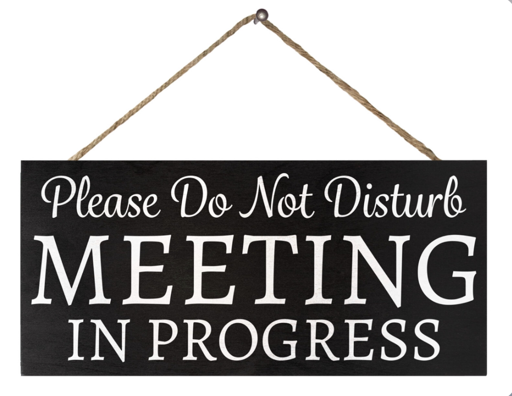 Do not disturb meeting sign