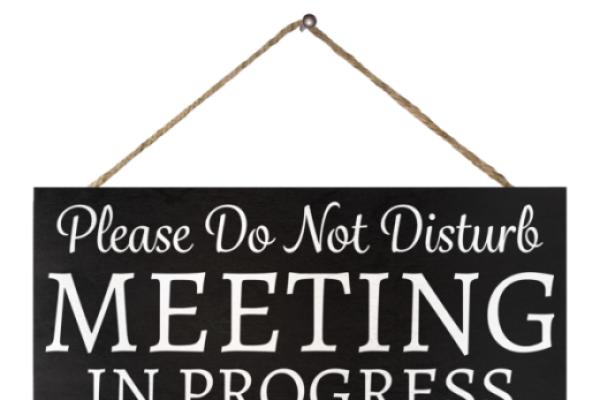 Do not disturb. Meeting in Progress sign