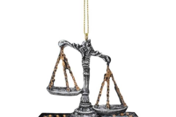 Scales of Justice rest on law books