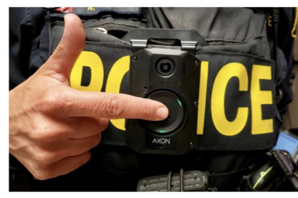 Police office activates body cam